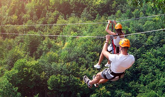 Ziplining in Munnar in Monsoon: Soaring Over Tea Estates & Waterfalls